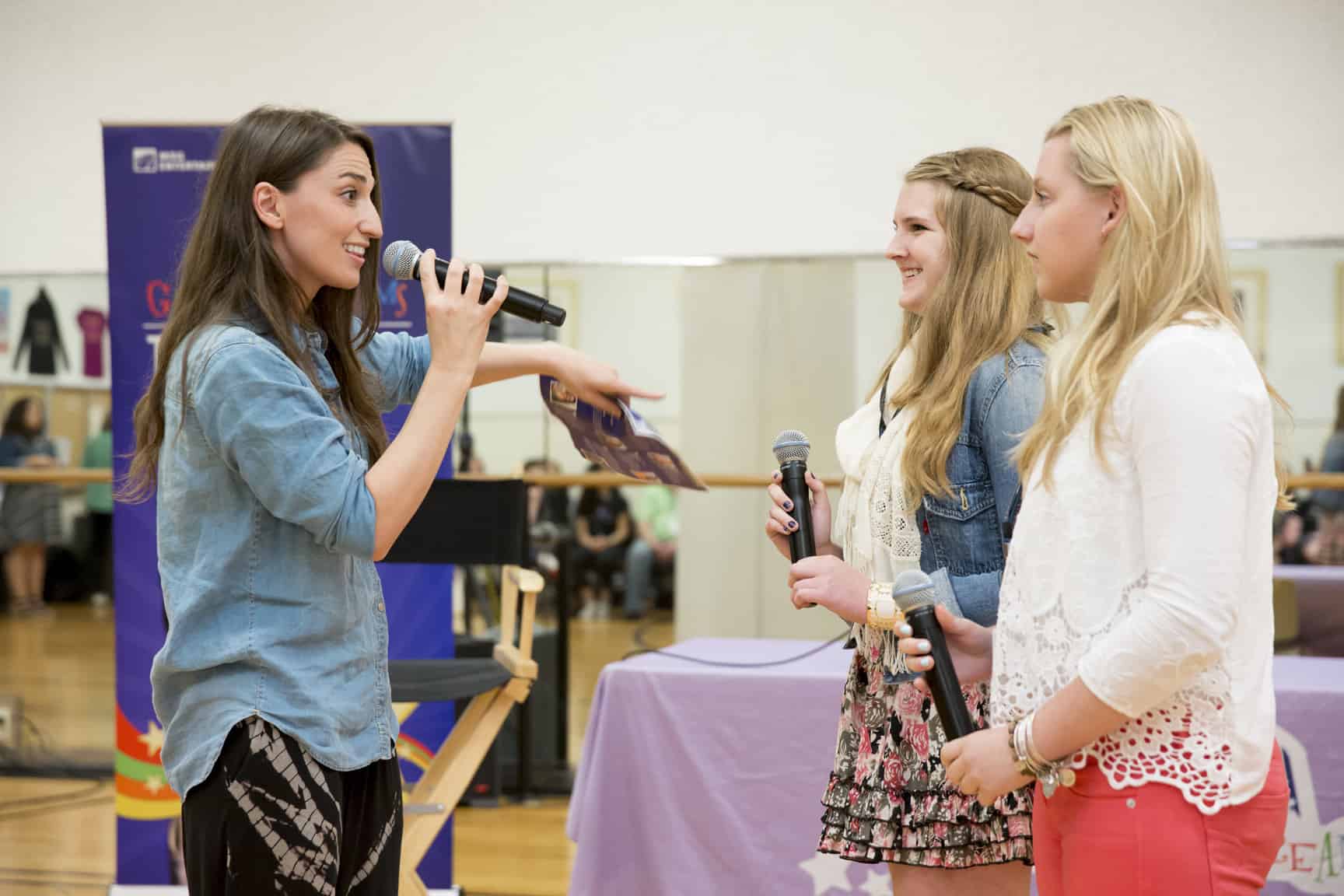 Musician Sara Bareilles mentors Gabrielle (center) in preparation for the Garden of Dreams Talent Show at Radio City Music Hall.